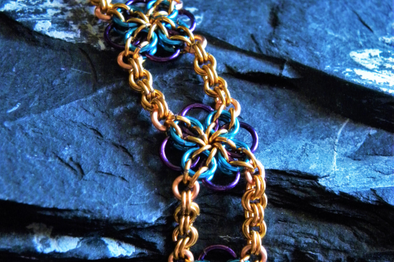 Copper and enameled copper Celtic Flower chainmaille bracelet