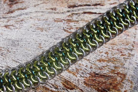 Sterling silver, lime green, and teal Crotalus bracelet by Handmaden Designs LLC