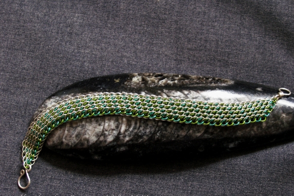 Sterling silver and aqua and lime green enameled copper Dragonscale bias bracele