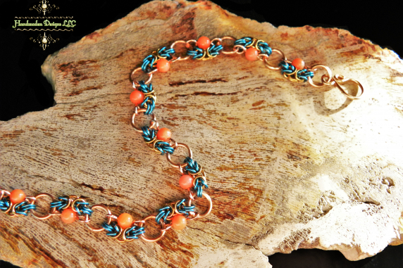 Copper and enameled copper Half-Romanov chainmaille bracelet with Pink Coral