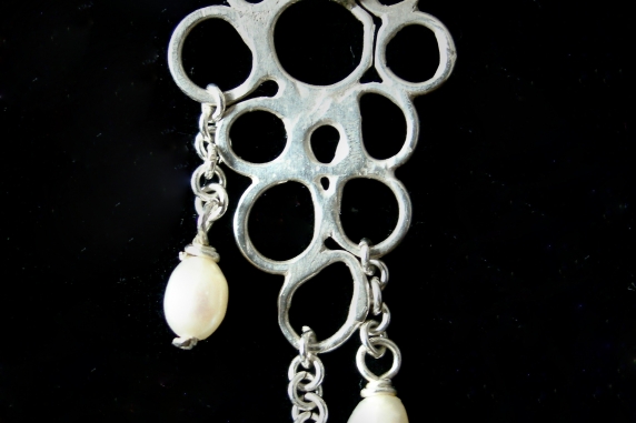 Free-form sterling silver and freshwater pearl silversmithing pendant