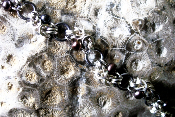 Half Romanov sterling silver, tantalum, and freshwater pearl bracelet.