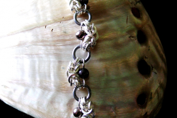 Half Romanov sterling silver, tantalum, and freshwater pearl bracelet.