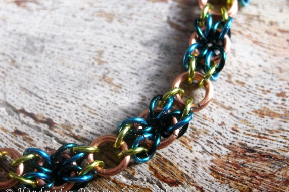 Copper, lime green, teal, and blue Snakes Eyes bracelet by Handmaden Designs LLC