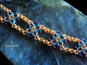 Annora - Handmaden Designs LLC Copper and enameled copper Celtic Flower chainmaille bracelet