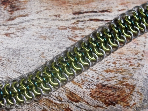 Sterling silver, lime green, and teal Crotalus bracelet by Handmaden Designs LLC