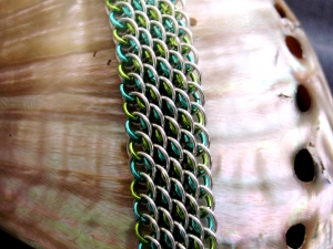Sterling silver and aqua and lime green enameled copper Dragonscale bias bracele