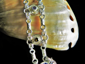 Eudora - Handmaden Designs LLC Sterling silver Tanzanite and Smokey Quartz Half Byzantine bracelet