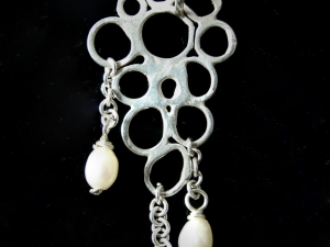 Free-form sterling silver and freshwater pearl silversmithing pendant